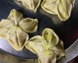 A picture of step 8 of Flower samosa with peas.