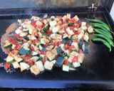 Une image de l'étape 7 de Merguez et légumes à l'orientale au citron confit et piments verts.