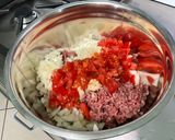 Une image de l'étape 9 de Courgettes et poivrons farcis bœuf, tomates et oignon.