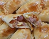 Foto del paso 3 de la receta: Empanadas de salchichas y queso