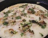 A picture of step 4 of Onion uttapam.