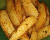 Foto del paso 2 de la receta: Papas en gajos estilo pizzería