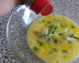 Foto del paso 2 de la receta: Omelette con cebollín y jamón o queso