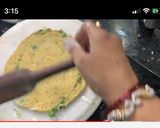 A picture of step 12 of Masala laccha paratha.