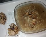 A picture of step 10 of Maggi soup with roasted nuts and chicken 😋😋😋😋.