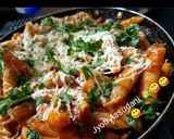 A picture of step 8 of Pink pasta with sauce.