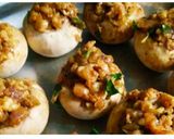 A picture of step 6 of Saucy shrimp stuffed mushrooms.