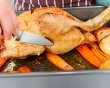A picture of step 22 of Roast Chicken with Potatoes & Carrots.