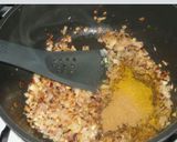 A picture of step 2 of Coconut fish curry.