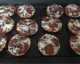 A picture of step 3 of Pizza bagels.