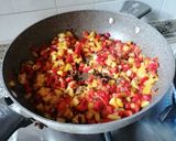 Foto del passaggio 4 della ricetta Spaghetti scanalati con tonno e peperoni