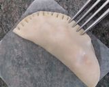 Foto del paso 7 de la receta Empanadillas de atún con cebolla caramelizada