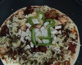 A picture of step 2 of Pizza with edible cookpad hat.