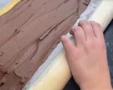 A picture of step 7 of Yule Log Cake.