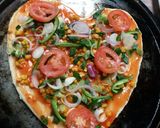 A picture of step 6 of Veg pizza.