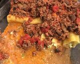 A picture of step 13 of Cheese and Spinach stuffed Cannelloni with a meat ragù.