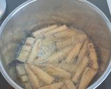 A picture of step 6 of Spanish eggplants with molasses.