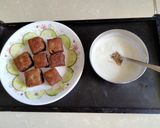 A picture of step 4 of Raw banana crispy bites with cucumber raita.