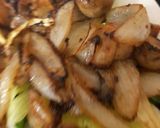 A picture of step 3 of Ribeye Steak onions and mushrooms. With homemade Chips 😀.