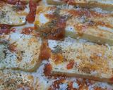 Foto del paso 6 de la receta: Pizza mitad anchoas, mitad olivas negras