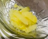 A picture of step 1 of Aam Ka Khatta Meetha Pana.