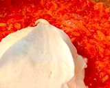 A picture of step 4 of Easy Creamy Tomato Sauce Stuffed Bell Peppers with Meat and Rice by TastyPinch.