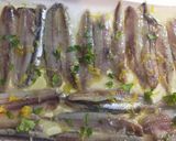 Foto del passaggio 3 della ricetta Alici marinate e bastoncini di carote zucchine al forno