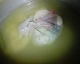 A picture of step 1 of Malligawtani soup with fried garlic bread.