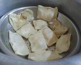 A picture of step 4 of Paneer masala puff in pan.