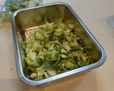 A picture of step 1 of Pasta alla vodka, with pork and sprouts.