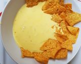 A picture of step 3 of Made Chedder cheese & Onion sauce with tortillas for dipping. 👍.