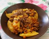Foto del passaggio 7 della ricetta Mezzelune zucca ricotta e tartufo saltate con zucca e porcini