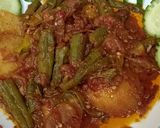 A picture of step 1 of Masala bhari bhindi.
