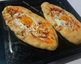 A picture of step 4 of Egg top chicken stuffed pide bread(turkish pide).
