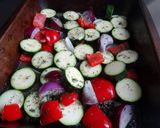 A picture of step 1 of Oven baked veg & bangers.