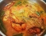 A picture of step 13 of Fish Curry with Vindi.