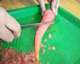A picture of step 1 of Gajar ka Halwa.
