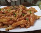A picture of step 15 of Crispy honey chilli potato.