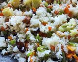 A picture of step 5 of Leftover Rice Pulau.