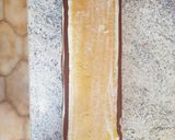 A picture of step 10 of Grand Marnier Bûche de Noël with Mandarin Insert.