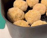 A picture of step 5 of Crispy Stuffed Mushrooms in the Air Fryer.