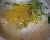 A picture of step 3 of Urad/maash ki khatti daal with bajrey ki roti.