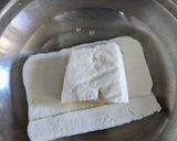 A picture of step 1 of Chhena poda.