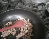 A picture of step 1 of Sweet con and hot dog fry rice.