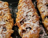 Foto del paso 6 de la receta: Cañas de hojaldre rellenas de turrón de chocolate y mermelada de naranja