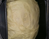 Kenyérsütőgépben kelesztett szalagos fánk recept fázis 2 fotója