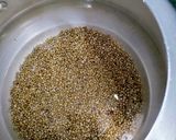 A picture of step 1 of Bajra(pearl millet) Upma.