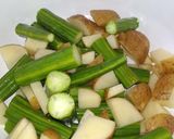 A picture of step 1 of Drumstick potato fry.