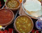 A picture of step 9 of Aloo ki takari, choley ka salan, suji ka halwa and puri.