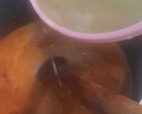 A picture of step 10 of Coconut party jollof rice.
